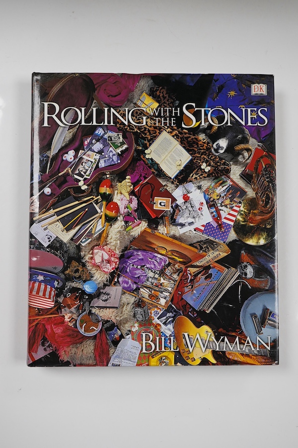 Wyman, Bill & Havers, Richard- Rolling with The Stones. 1st edition, coloured and other illus. throughout; publisher's coloured pictorial boards and d/wrapper, folio. Dorling Kindersley, 2002. *signed by both authors on
